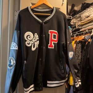 Black Jacket with Red and Blue Patches